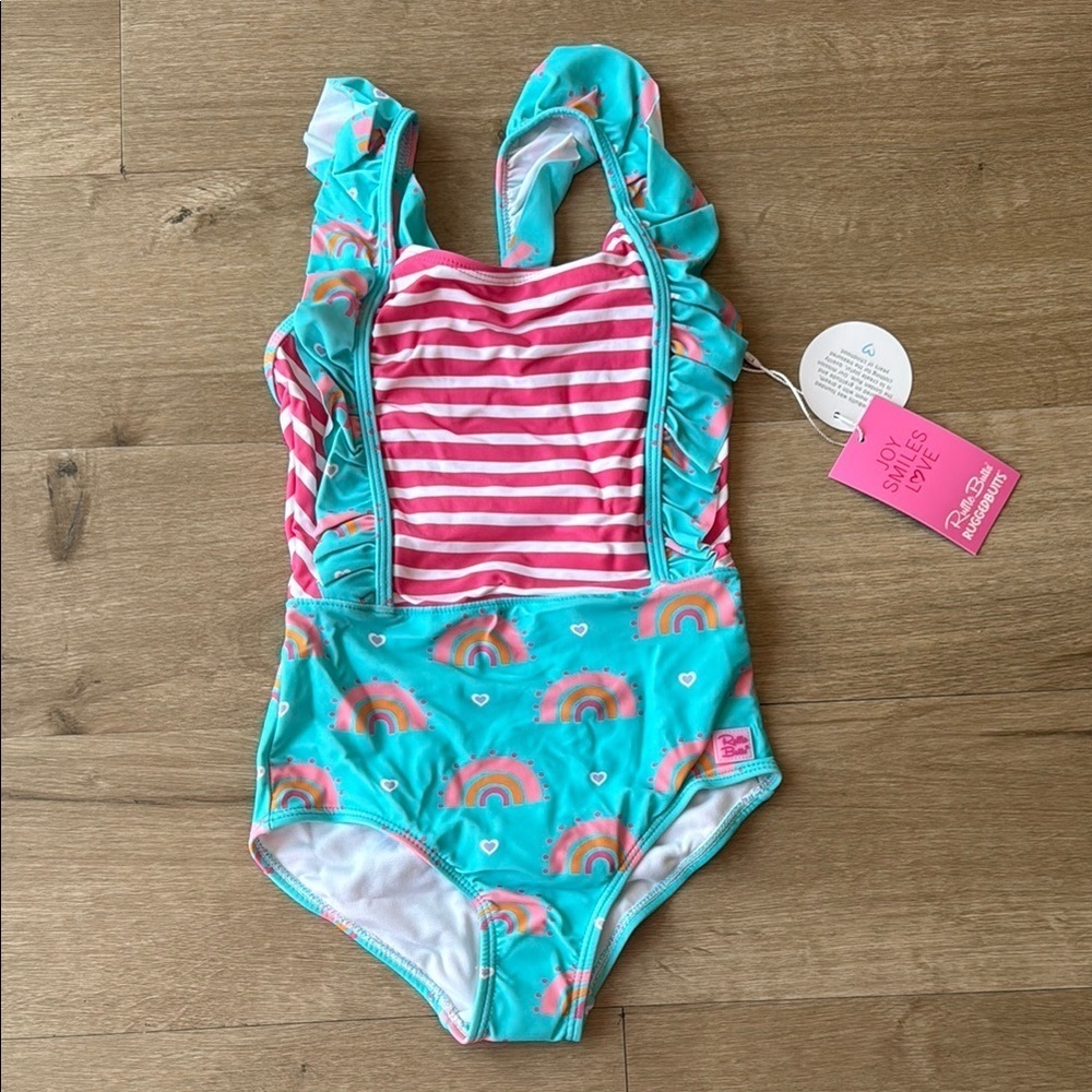 Ruffle Butts Swimming Suit.  Girl’s size 7. New with tags. One piece.